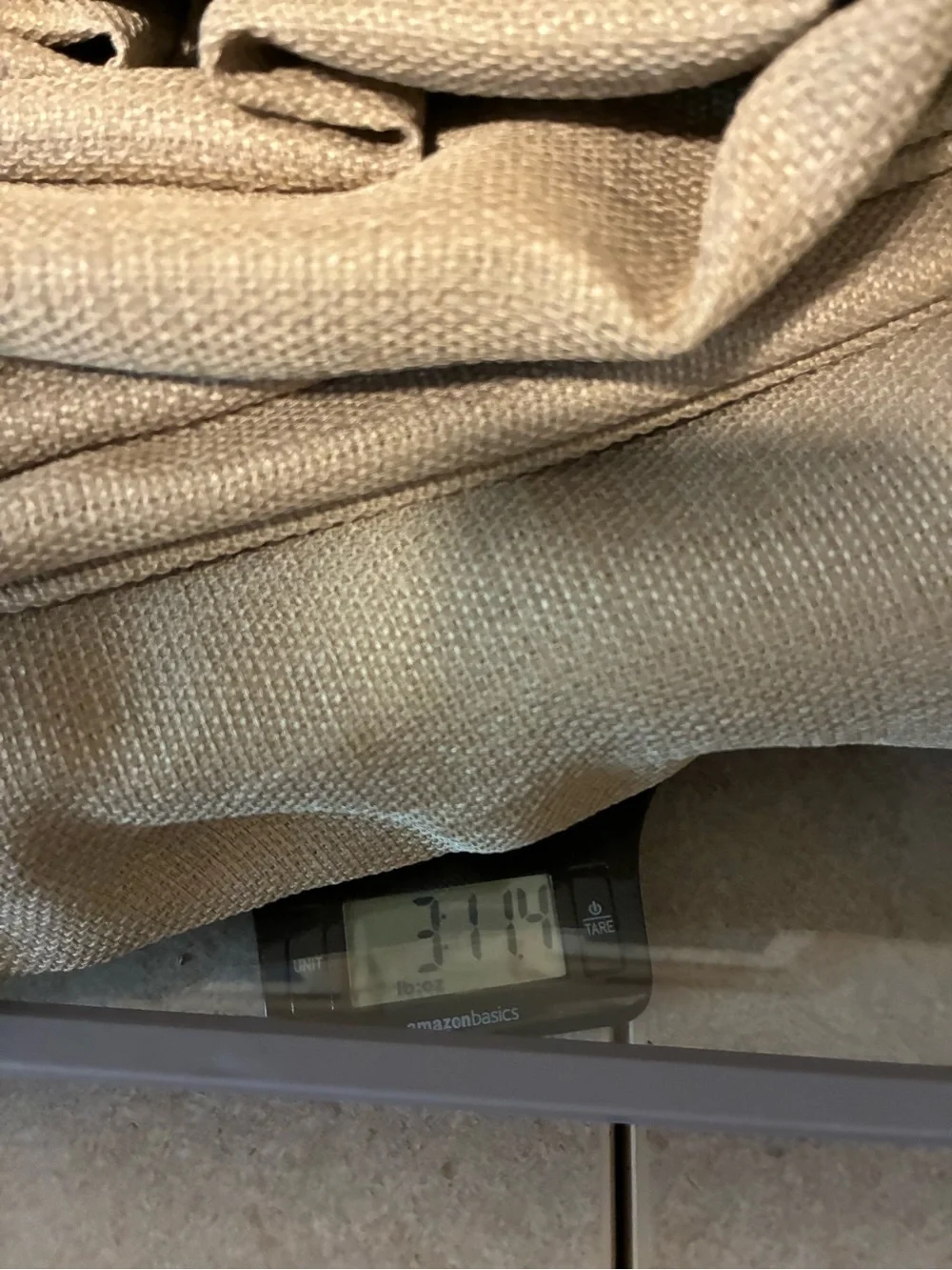 Tan grommet-top curtain panel measures approximately 90 in length 50 width. EUC